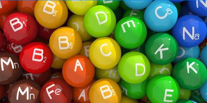 Bolas coloridas com ícones de vitaminas e minerais